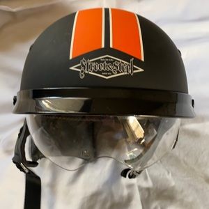 Street and steel motorcycle half helmet.